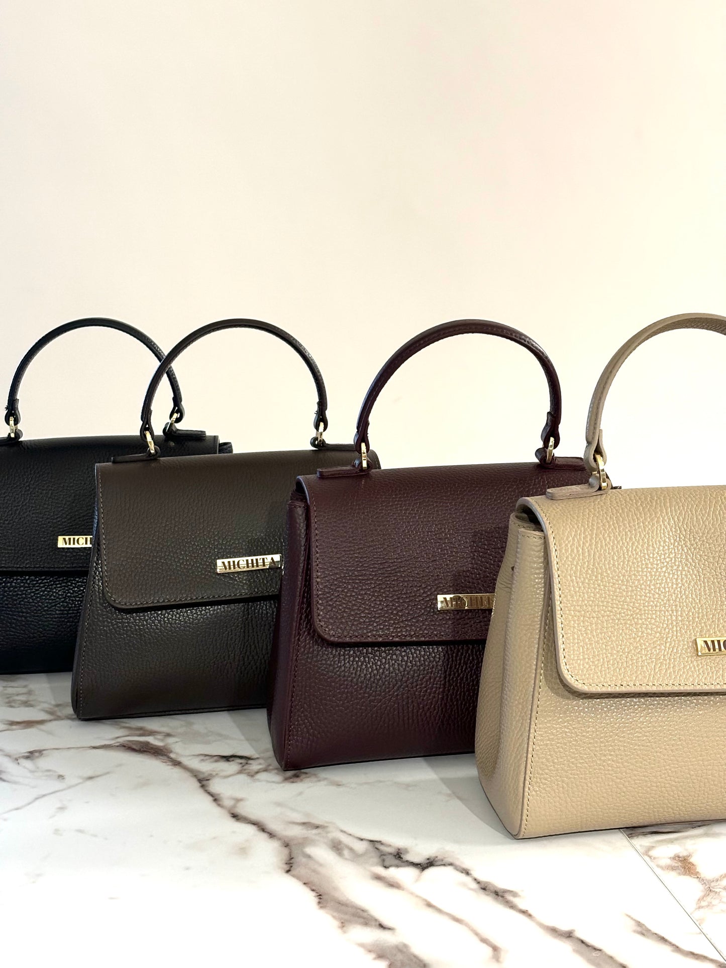 Florence Bag MICHITA in tutti i colori – nero, dark chocolate, bordeaux e taupe in vera pelle